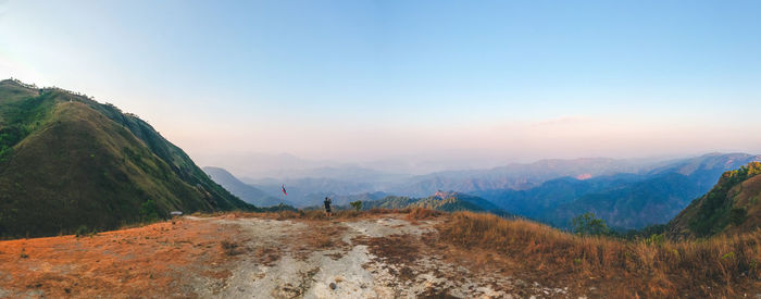 Panorama view on mountain in morning and cameraman enjoying the beautiful nature view.