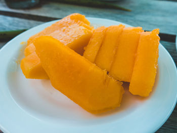 High angle view of orange slice in plate