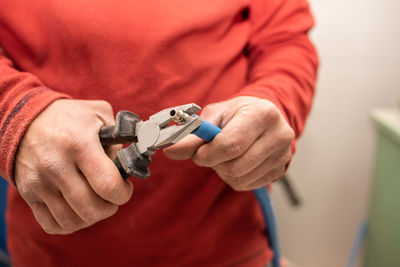 Midsection of man working