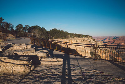 Scenic view of landscape against clear blue sky