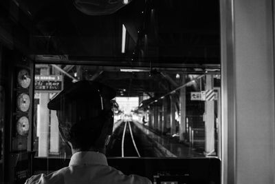 Rear view man in train