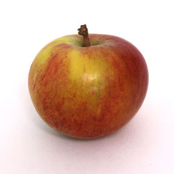 Close-up of apple against white background