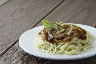 Close-up of noodles in plate on table