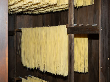 Vintage wooden pasta production plant, italian spaghetti.