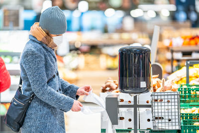 Woman shopping in supermarket