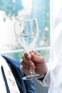 Man holding glass of wine