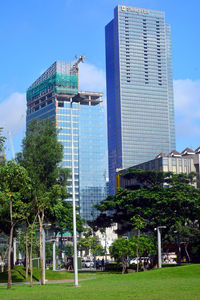 Buildings in city against sky