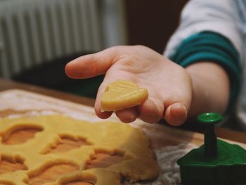 Close-up of hand holding cookies 