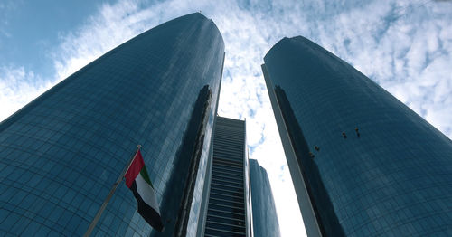 Low angle view of modern buildings against sky