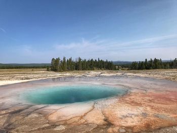 Landscape of blue geyser pool in yellowstone national park