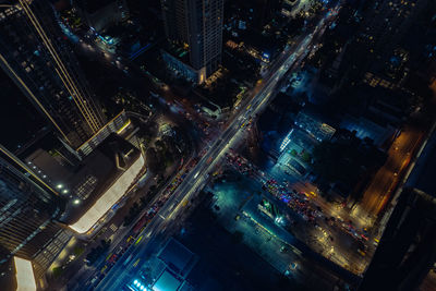 High angle view of illuminated cityscape at night