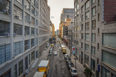 High angle view of street amidst buildings in city