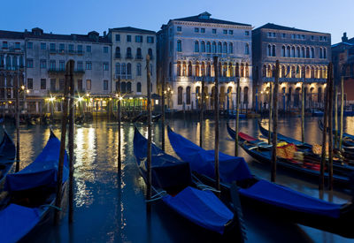 Gondolas on the canal grande in the blue hour in venice