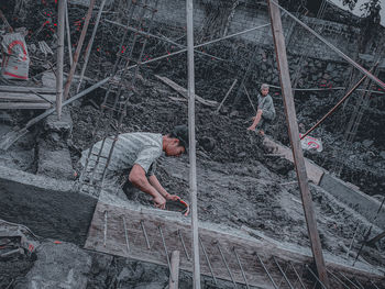 High angle view of men working at construction site