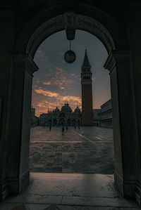 View of historic building against sky during sunset