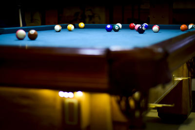 Colorful pool balls on table