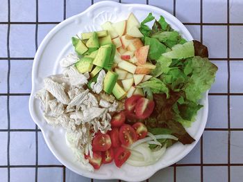 High angle view of chopped vegetables in bowl on table