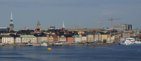 Buildings in city against sky