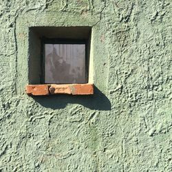 Window on wall of old building