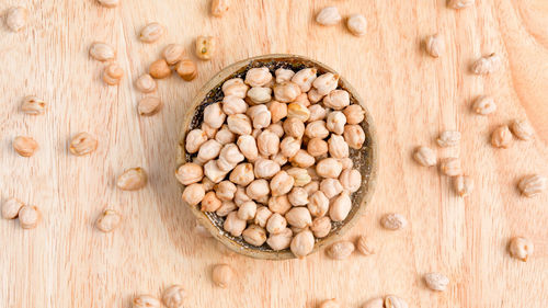 Close-up of roasted coffee beans on table