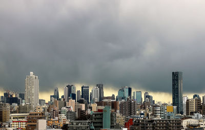 Modern cityscape against sky