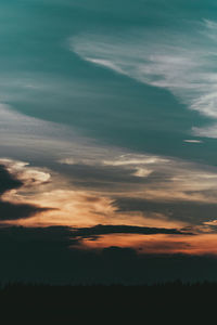 Scenic view of dramatic sky during sunset