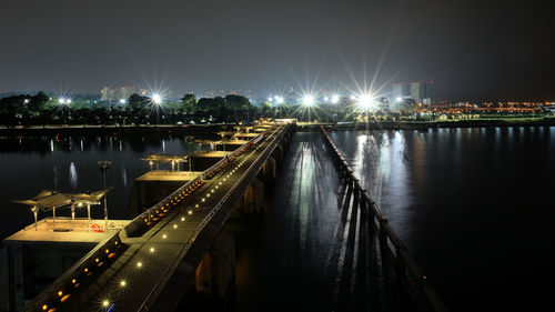 View of illuminated bridge at night