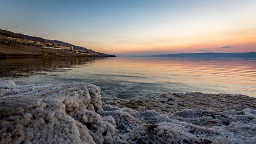 Scenic view of sea against sky during sunset