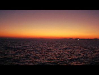 Scenic view of sea at sunset