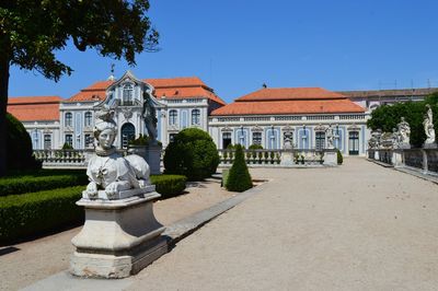 Statue against clear blue sky