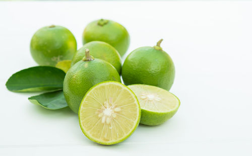 Close-up of fruits against white background