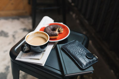 High angle view of coffee cup on table