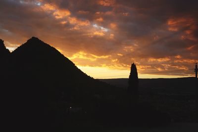 Scenic view of silhouette against sky during sunset