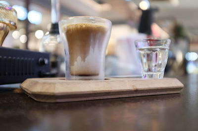 Close-up of coffee served on table