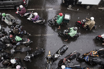 Directly above shot of people on street during rainy season