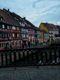 Buildings in city against sky