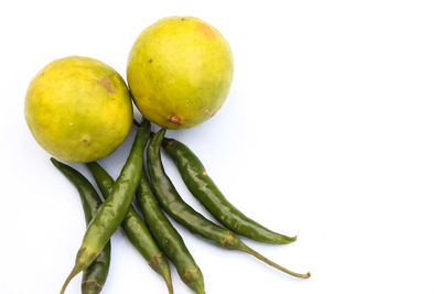 Close-up of fruits against white background