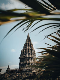 Low angke view of prambanan temple against blue sky