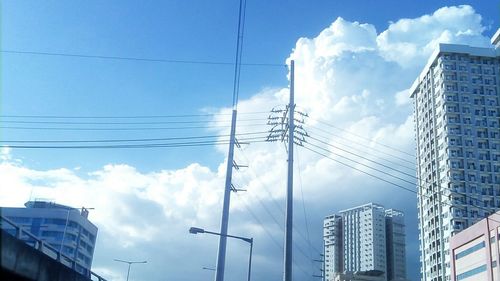 Low angle view of skyscrapers against sky