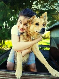Portrait of girl with dog