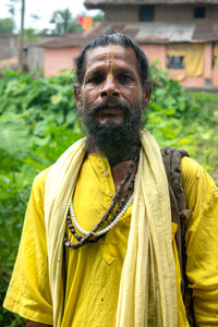 Portrait of man standing outdoors