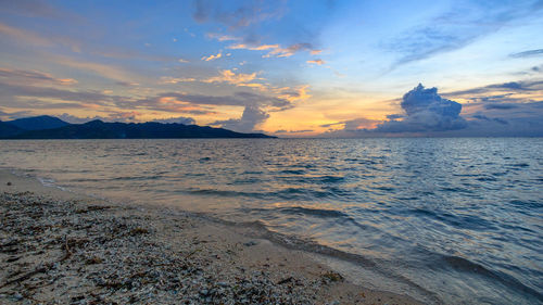 Scenic view of sea against sky during sunset