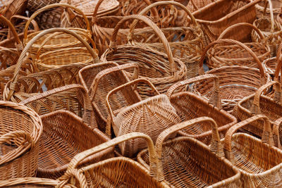 A lot of of many wicker baskets for sale - closeup full-frame background