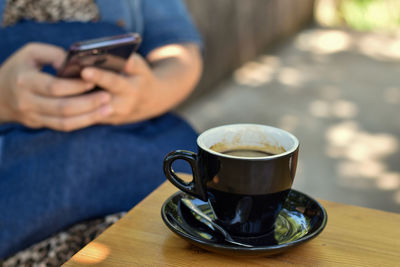 Coffee cup on table