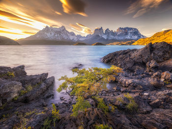 Scenic view of sea against sky during sunset