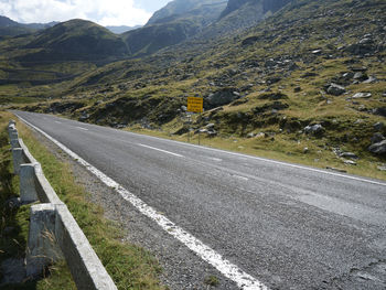 Road leading towards mountains