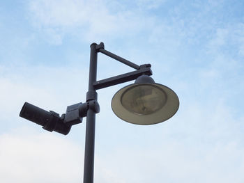 Low angle view of street light against sky