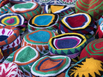 Full frame shot of colorful caps for sale at market