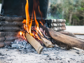 Close-up of firewood burning outdoors