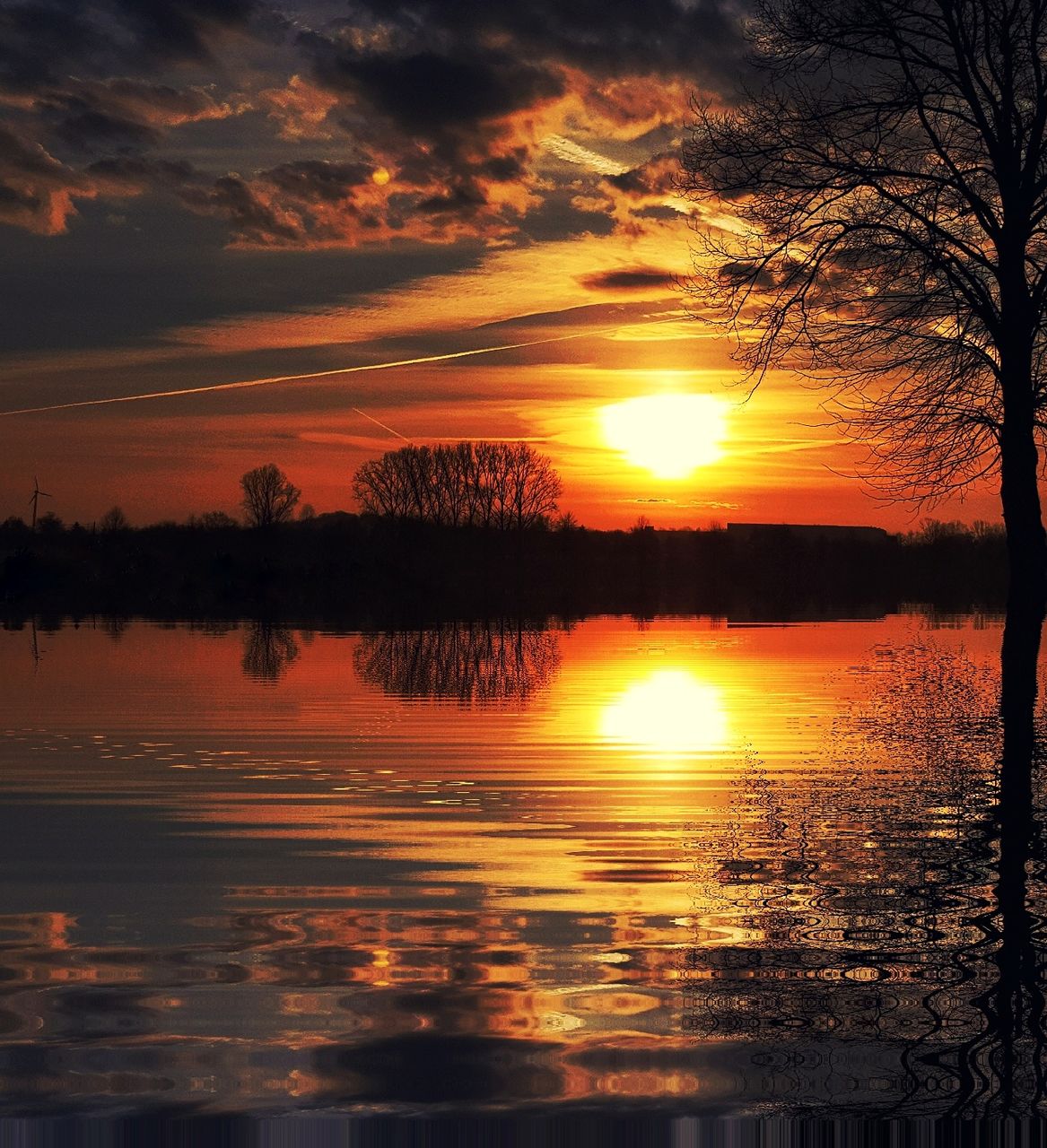 sunset, reflection, beauty in nature, nature, scenics, tranquil scene, orange color, tranquility, water, silhouette, sky, cloud - sky, idyllic, dramatic sky, outdoors, sun, no people, lake, tree, awe